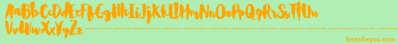 CarlitosDemo Font – Orange Fonts on Green Background