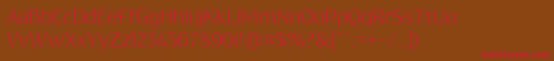 フォントResagokrLight – 赤い文字が茶色の背景にあります。