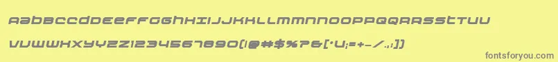 Nextwaveboldital-fontti – harmaat kirjasimet keltaisella taustalla