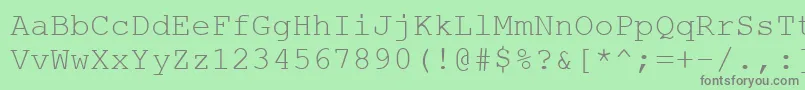 フォントCourtierc – 緑の背景に灰色の文字