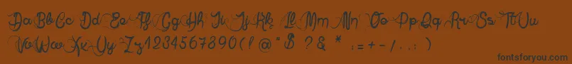 AnneExilum Font – Black Fonts on Brown Background
