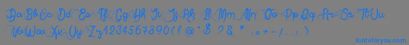 AnneExilum-Schriftart – Blaue Schriften auf grauem Hintergrund