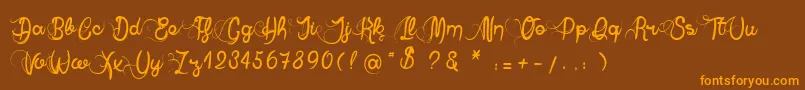 AnneExilum Font – Orange Fonts on Brown Background
