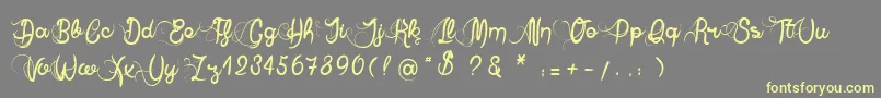 AnneExilum Font – Yellow Fonts on Gray Background