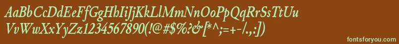 フォントJunicodeBolditaliccondensed – 緑色の文字が茶色の背景にあります。