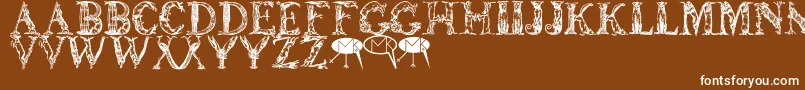 Lettersanimales-Schriftart – Weiße Schriften auf braunem Hintergrund