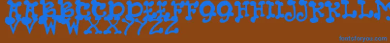 JmhPetsCaps Font – Blue Fonts on Brown Background