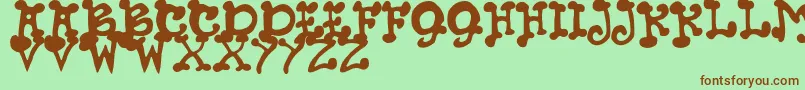 JmhPetsCaps Font – Brown Fonts on Green Background