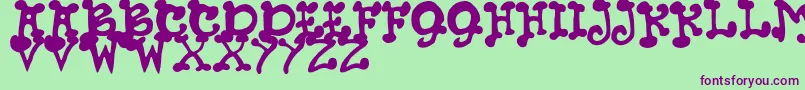 JmhPetsCaps Font – Purple Fonts on Green Background