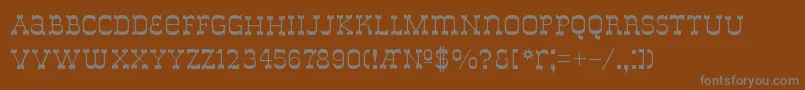 DelouisvilleBold-fontti – harmaat kirjasimet ruskealla taustalla