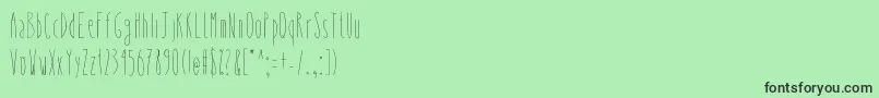 Czcionka Whysoskinny – czarne czcionki na zielonym tle