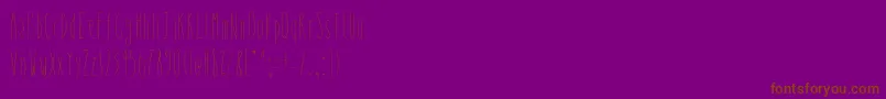 Czcionka Whysoskinny – brązowe czcionki na fioletowym tle