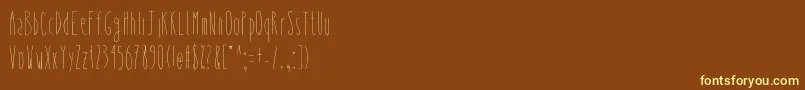 Czcionka Whysoskinny – żółte czcionki na brązowym tle
