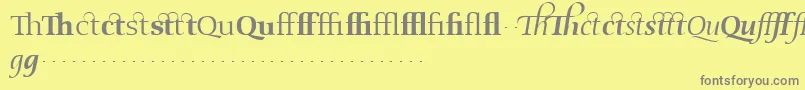 fuente OldstyleflourishesRegular – Fuentes Grises Sobre Fondo Amarillo