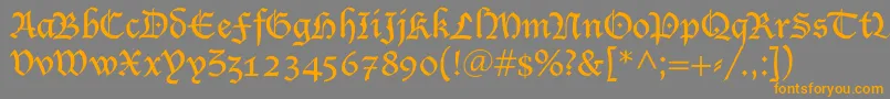 フォントSaintgermainBlack – オレンジの文字は灰色の背景にあります。