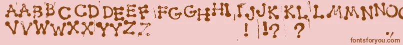 SmudgyDotStamps Font – Brown Fonts on Pink Background