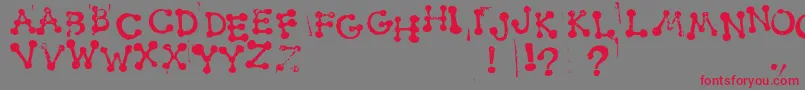 SmudgyDotStamps Font – Red Fonts on Gray Background