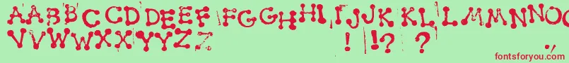 フォントSmudgyDotStamps – 赤い文字の緑の背景