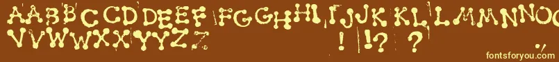 SmudgyDotStamps Font – Yellow Fonts on Brown Background