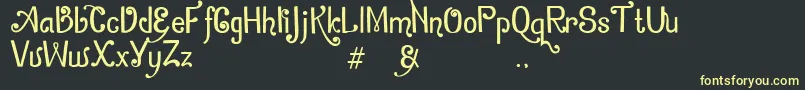 ZamrudKhatulistiwa Font – Yellow Fonts on Black Background