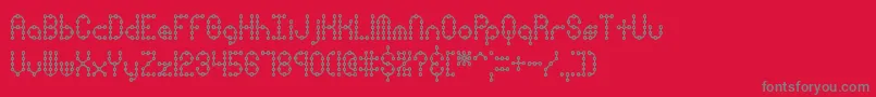 フォントPindownXPlainBrk – 赤い背景に灰色の文字