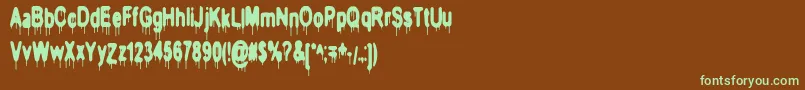HeadInjuries-fontti – vihreät fontit ruskealla taustalla