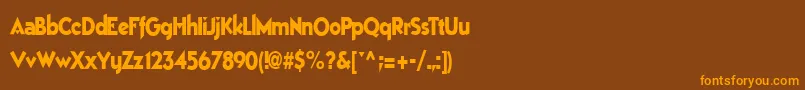 フォントBestsevenfont77RegularTtcon – オレンジ色の文字が茶色の背景にあります。