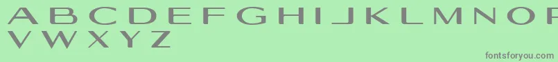 フォントGeogiquas – 緑の背景に灰色の文字