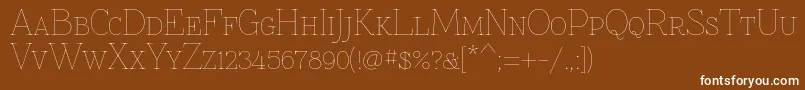 Znikomitsc Font – White Fonts on Brown Background