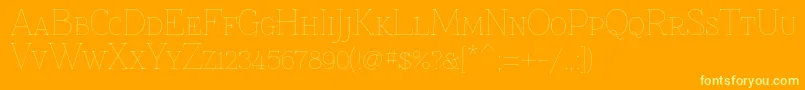 Znikomitsc Font – Yellow Fonts on Orange Background