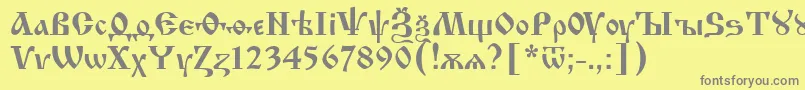 フォントIzhit55 – 黄色の背景に灰色の文字