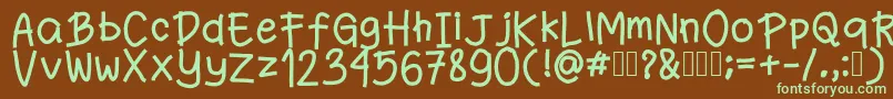 フォントFanande – 緑色の文字が茶色の背景にあります。