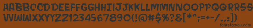 MondobeyondobbReg Font – Black Fonts on Brown Background