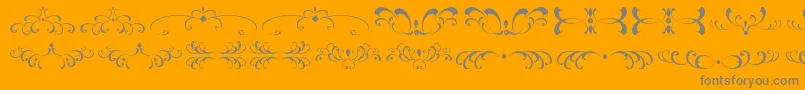 FiligreesAndOrnamentsSt Font – Gray Fonts on Orange Background