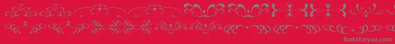 FiligreesAndOrnamentsSt Font – Gray Fonts on Red Background