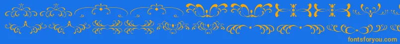 Шрифт FiligreesAndOrnamentsSt – оранжевые шрифты на синем фоне