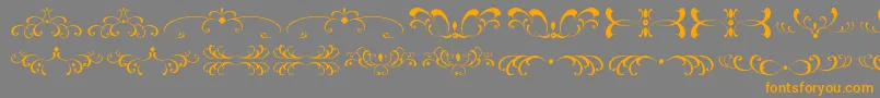 FiligreesAndOrnamentsSt Font – Orange Fonts on Gray Background