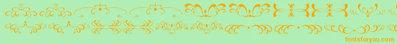 FiligreesAndOrnamentsSt Font – Orange Fonts on Green Background
