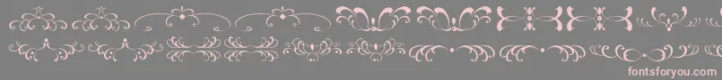 Fonte FiligreesAndOrnamentsSt – fontes rosa em um fundo cinza