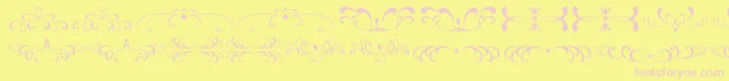 FiligreesAndOrnamentsSt Font – Pink Fonts on Yellow Background