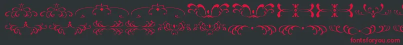 FiligreesAndOrnamentsSt Font – Red Fonts on Black Background