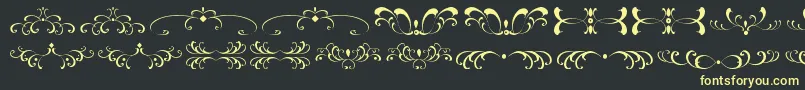 FiligreesAndOrnamentsSt Font – Yellow Fonts on Black Background