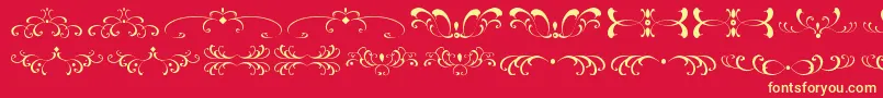 Fonte FiligreesAndOrnamentsSt – fontes amarelas em um fundo vermelho