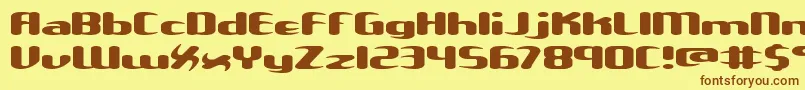 フォントUnxgalaw – 茶色の文字が黄色の背景にあります。