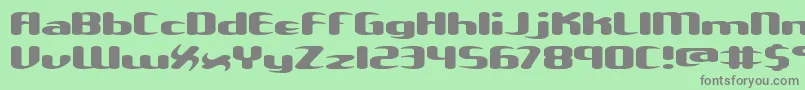 Unxgalaw-fontti – harmaat kirjasimet vihreällä taustalla