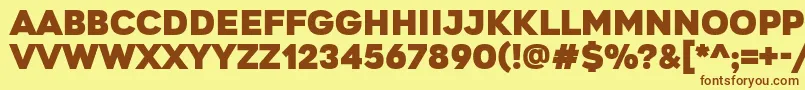 フォントGretarosRegular – 茶色の文字が黄色の背景にあります。