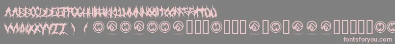 フォントGrindmafia – 灰色の背景にピンクのフォント