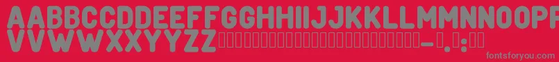 フォントCreditverseFont – 赤い背景に灰色の文字