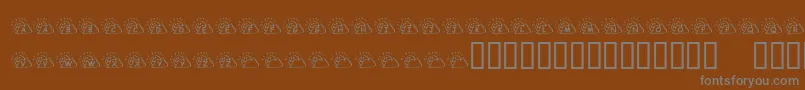フォントKrSunnyDays – 茶色の背景に灰色の文字