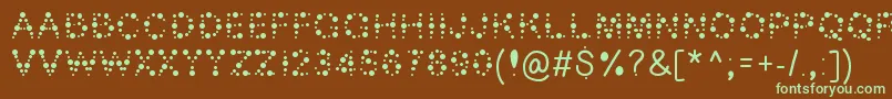 Bubble ffy-Schriftart – Grüne Schriften auf braunem Hintergrund